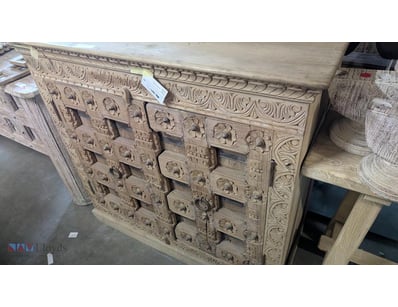 Ornately carved timber cupboard featuring exceptio...