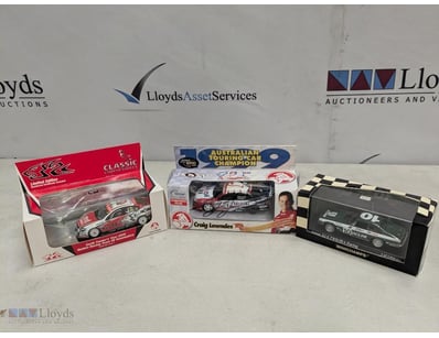 COLLECTION OF THREE DIECAST MODEL RACING CARS - AU...