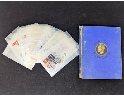 MERCURY WORLD STAMP ALBUM WITH VARIOUS WORLD STAMP...