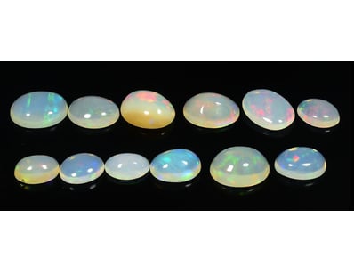 9.48CT NATURAL OPAL

Shape: Oval Cabochon Colour...