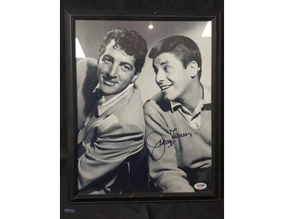 A FRAMED PHOTOGRAPH FEATURING THE ICONIC COMEDY DU...