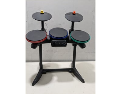 Electronic drum kit featuring five rubber drum pad...