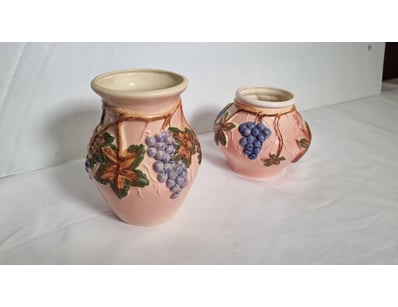 PAIR OF PINK CERAMIC VASES WITH GRAPE AND VINE MOT...