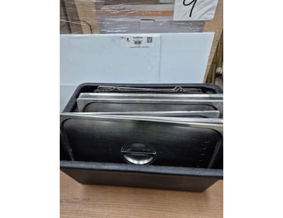 Lot of baking trays and baking lids.

SOLD AS LOT...