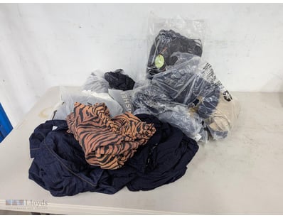Assorted lot of mixed clothes

Sold as lot
