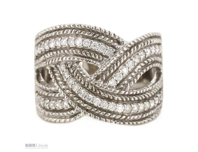 14K WHITE GOLD AND DIAMOND, BRAIDED RING.      

T...