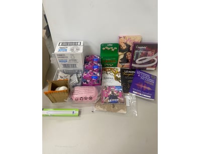 Box of mixed goods including womens health pads, l...