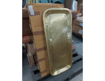 Brass plate carved with intricate decorative relie...