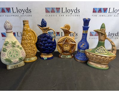 COLLECTION OF JIM BEAM CERAMIC WHISKY DECANTERS
...