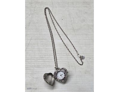 Najo necklace, with watch pendant stamped '925'
...