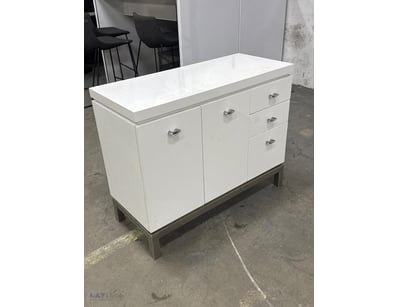 Modern white kitchen cabinet base unit featuring a...
