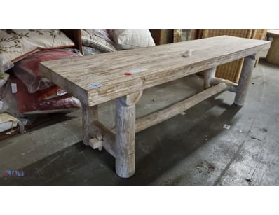 Rustic wooden bench featuring a light oak or weath...