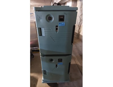 insulated food transport containers stacked vertic...