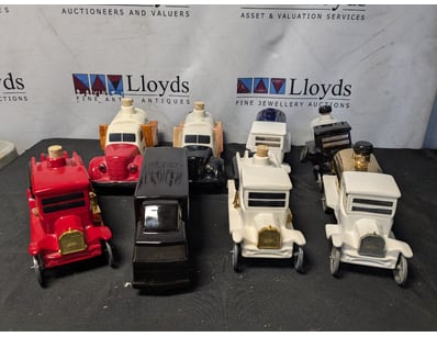 CERAMIC NOVELTY DECANTER COLLECTION - DISTRICT 12 ...