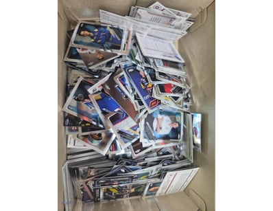 Large collection of sports trading cards and memor...