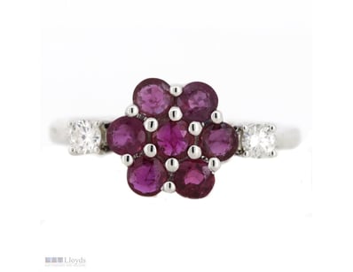 14K WHITE GOLD, RUBY AND DIAMOND, FLORAL RING.    ...