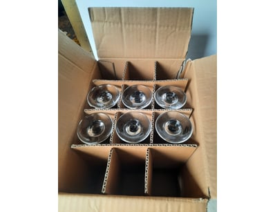 Box of six wine glasses.

Note two have chips.

SO...