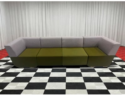 Modern modular sectional sofa featuring a contempo...