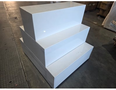 White Display stand on wheels.