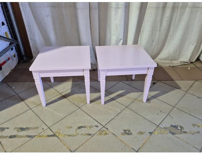 Pair of side table, timber style, pink finish.

...