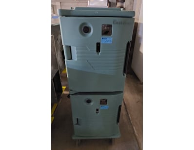 Vintage National brand stacked dryer units compris...
