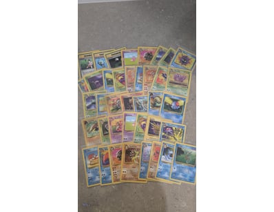 ASSORTED POKEMON 1999 BASE FOSSIL SINGLES

Include...