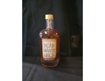 Dead Man's Gold Spiced Rum, a premium barrel-aged ...