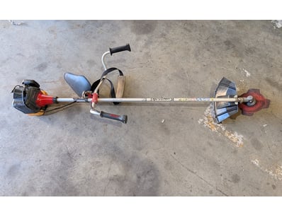 Kawasaki petrol-powered string trimmer/brush cutte...
