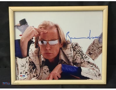 A HAND-SIGNED PHOTOGRAPH OF ACTOR BILL NIGHY.

Ite...