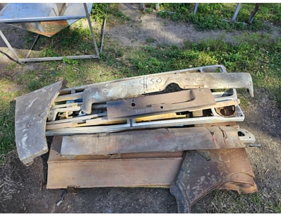 Assorted car parts, including bumper, side panel

...