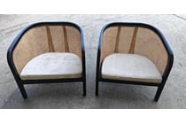 20 · Pair of Black-Framed Cane Barrel Armchairs