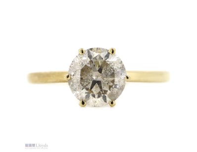 THE CENTRE FEATURES, ONE ROUND BRILLIANT CUT, DIAM...