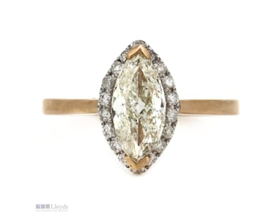 14K ROSE GOLD AND DIAMOND, HALO RING.      

The C...