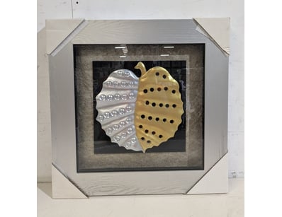 Contemporary framed art piece featuring a dual-ton...