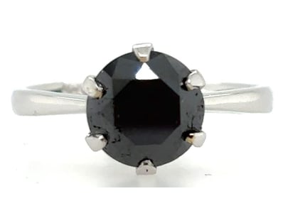 18K WHITE GOLD AND BLACK DIAMOND SOLITAIRE RING  
...