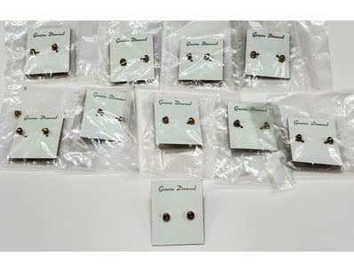 COLLECTION OF GOLD PLATED DIAMOND STUD EARRINGS

M...