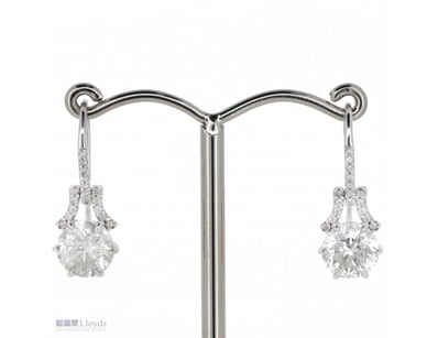 14K WHITE GOLD AND DIAMOND, DROP EARRINGS.      

...