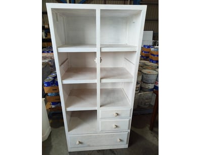 White painted timber shelving unit featuring dual-...