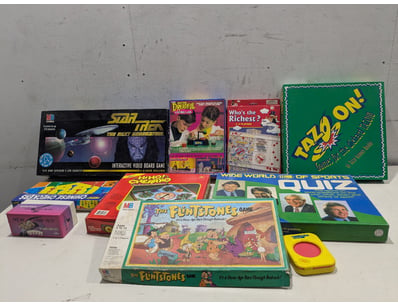 Vintage board game collection featuring 1980s-1990...