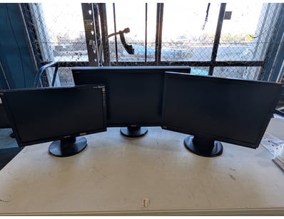 Lot of three computer monitors, various models.
...
