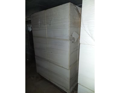 White laminate shelving unit featuring two adjusta...