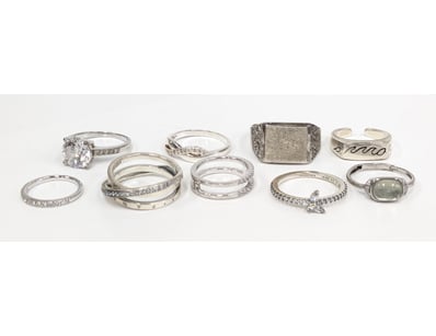 Lot of 9 assorted sterling silver rings featuring ...