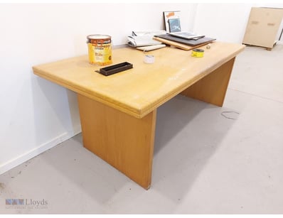 Solid timber office desk featuring a light oak fin...