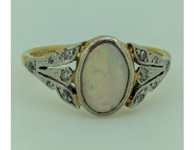 18CT OPAL AND DIAMOND 1937 LEVINSON RING

Ring S...