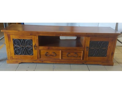 Wooden TV entertainment unit featuring timber cons...