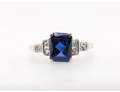 SILVER, CZ AND SAPPHIRE RING


583010+258


