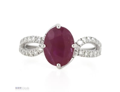 14K WHITE GOLD, RUBY AND DIAMOND, TWIST BAND RING....
