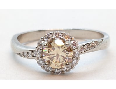 CHAMPAGNE ROUND BRILLIANT CUT SILVER DIAMOND RING
...