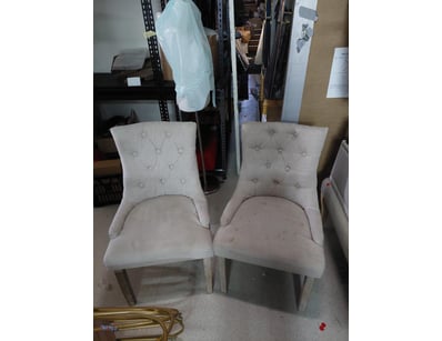 Pair of contemporary upholstered dining chairs fea...