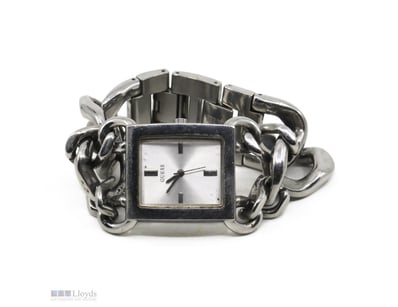 VINTAGE "GUESS" MOD W0438L1 LADIES WATCH.      

B...